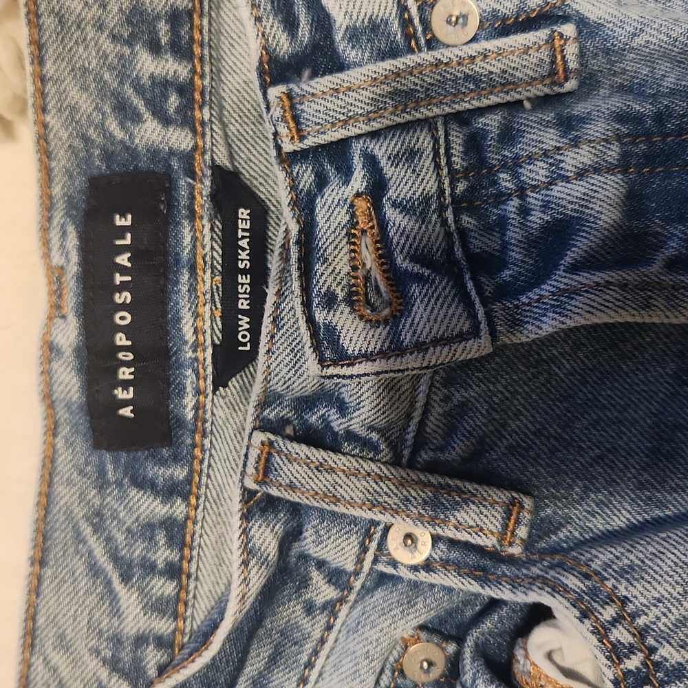 Distressed low rise skater jeans